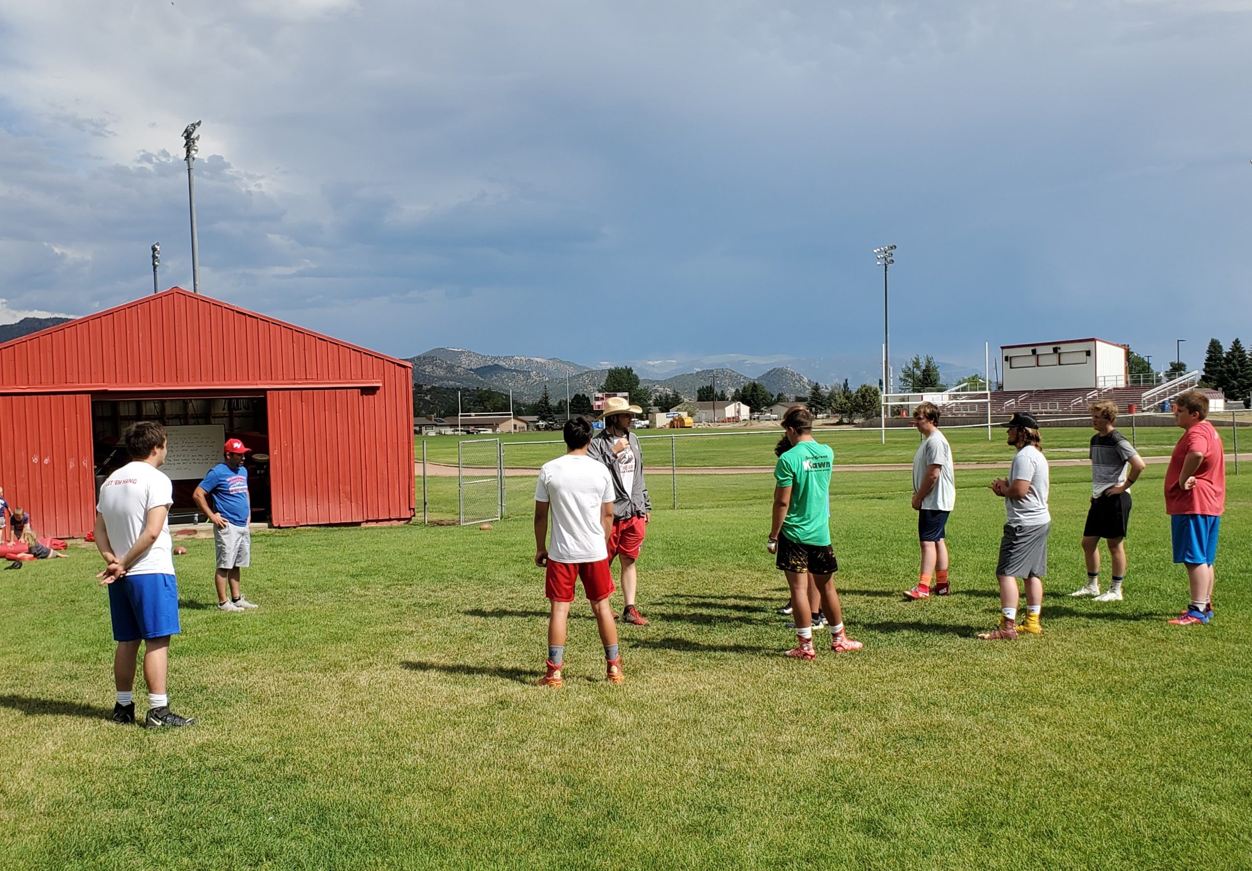 New faces but same routine, Demon football is back at camp